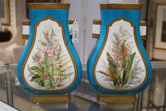 A pair of Minton porcelain flattened baluster vases, c.1880, height 10in.